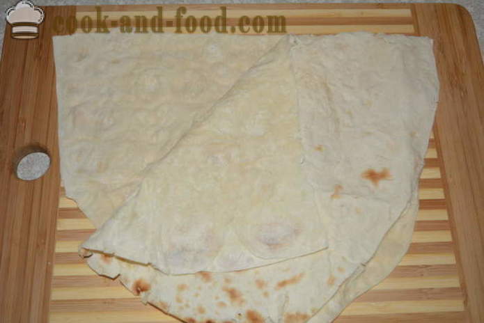 Un rouleau simple composé de pain pita avec du sprat, du fromage et des œufs - comment faire cuire un pain pita avec du sprat, étape par étape des photos de recettes